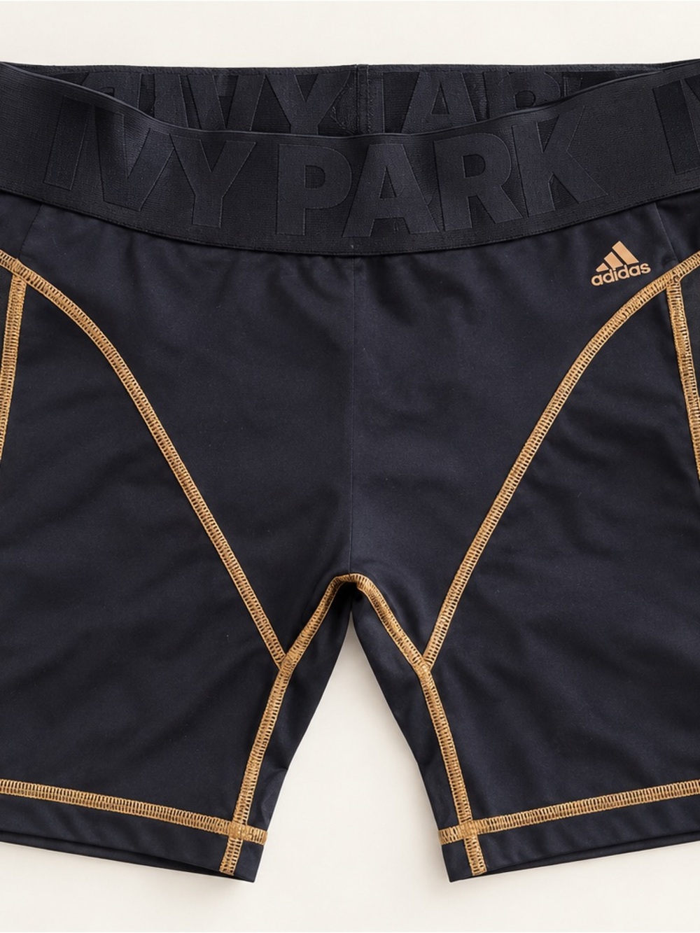 adidas IVY PARK Black Athletic Compression Shorts with Gold Trim